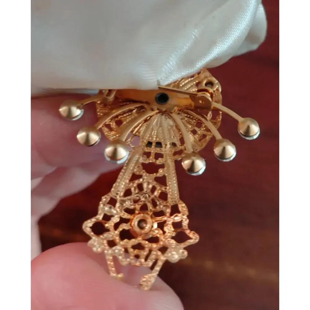 Vintage 1960s Virgin Mary Aurora Borealis and filigree brooch
